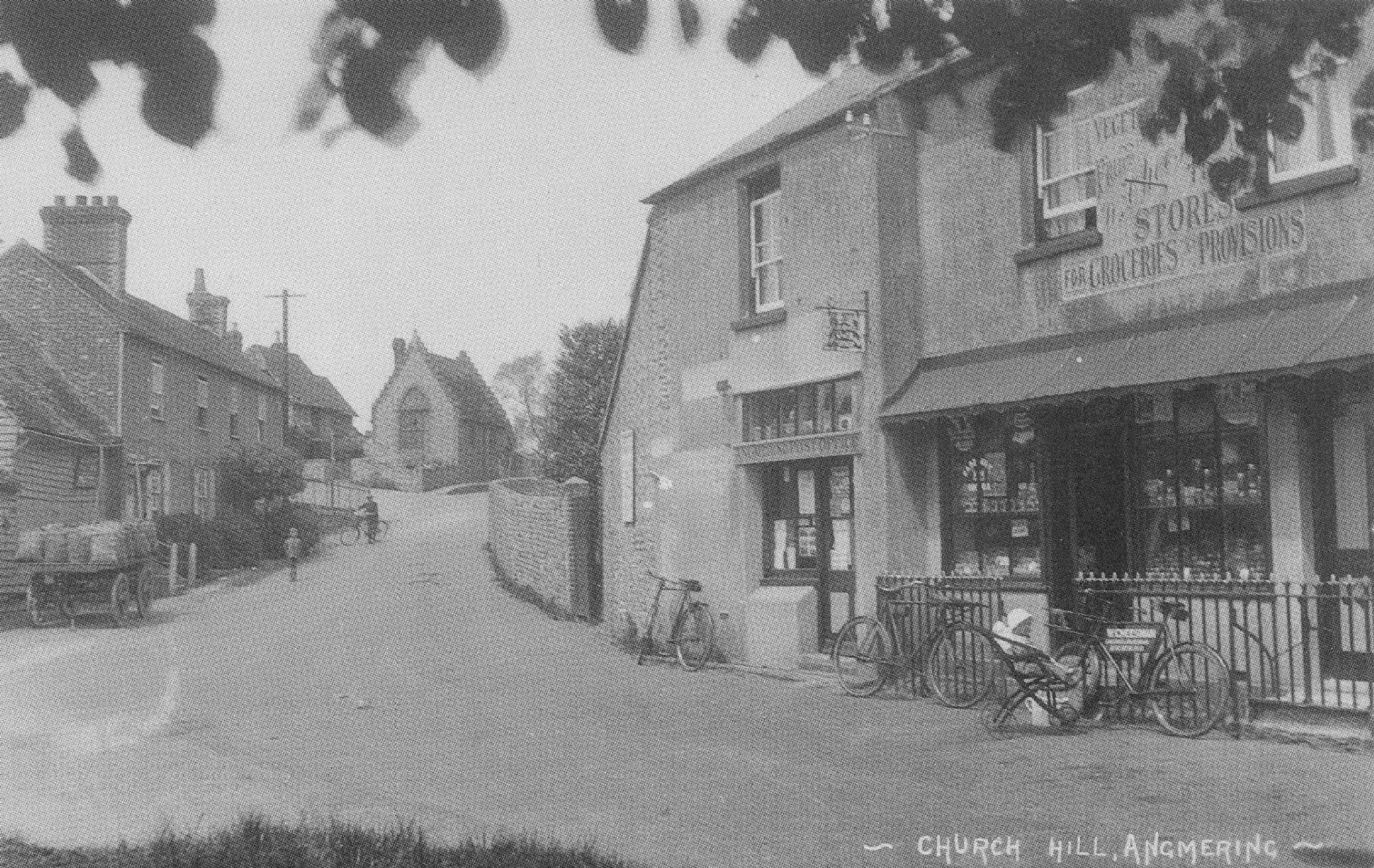 Walter Cheesemans Grocers on Church Hill Angmering Bicycle Sussex Postcard