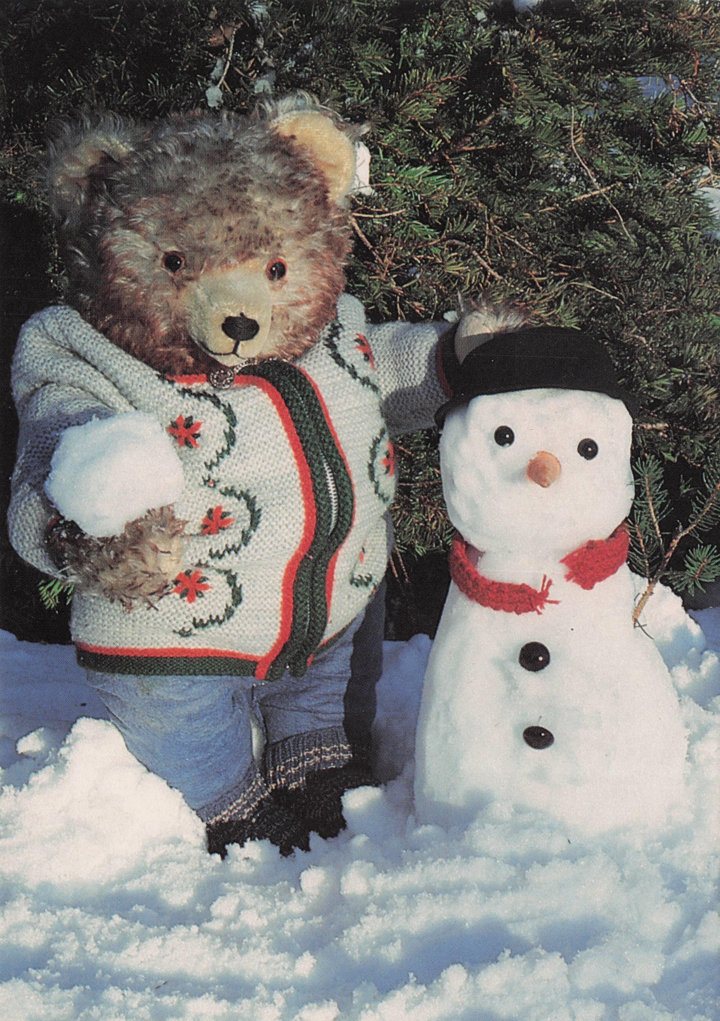 Teddy Bear Building Winter Snowman At Christmas Postcard