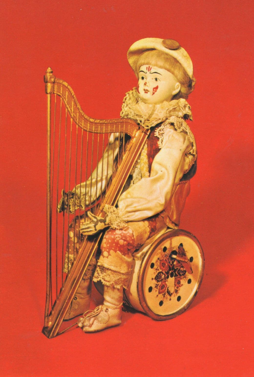 Clockwork Clown Face Old Toy Doll Playing Harp Museum Postcard