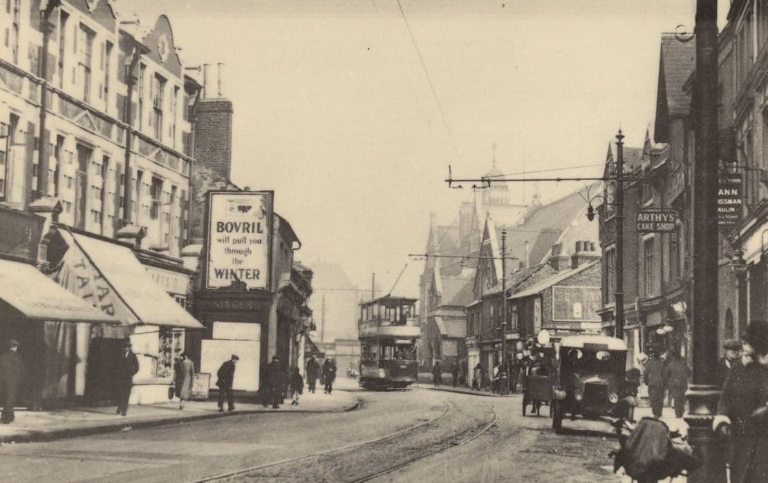 East Street Barking in 1928 Bovril Poster Bakers Cake Shop Postcard