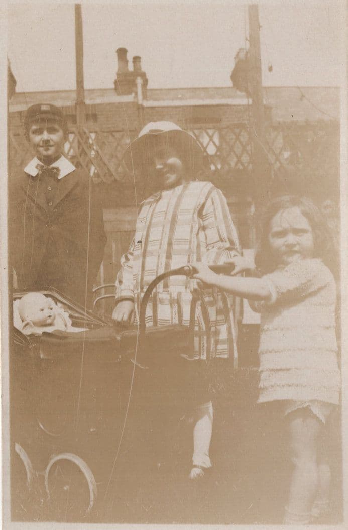 Giant Toy Doll Dolly in Pram Antique Real Photo Postcard