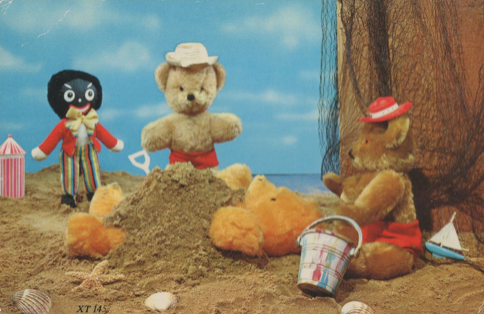 Golliwog On Beach Burying Teddy Bear Alive Toy Boat 1970s Postcard
