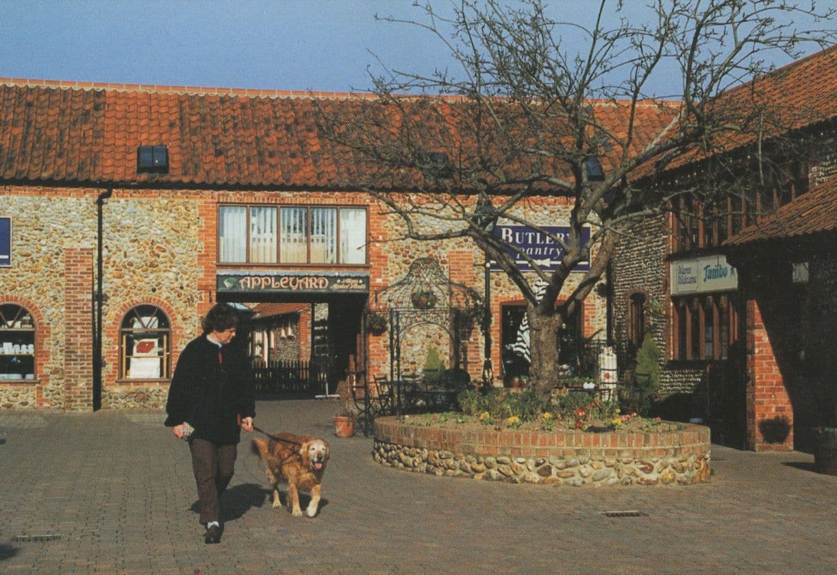 Man Walking Dog at Butlers Bakers Pantry Holt Norfolk Postcard