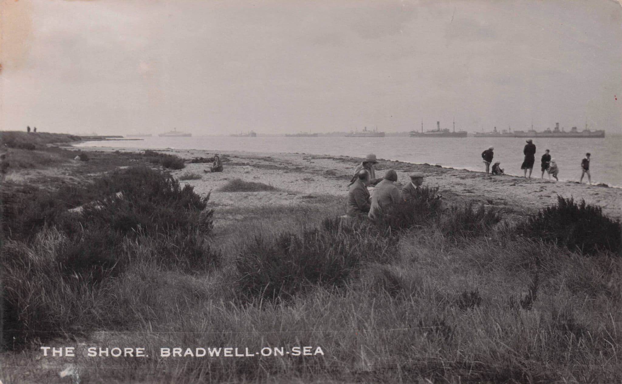 Old Fashions at Bradwell On Sea Windy Shore Essex Real Photo Postcard