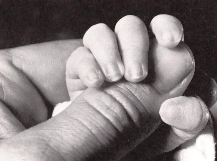Babys Hand With Giant Thumb Optical Illusion Photographic Art Postcard