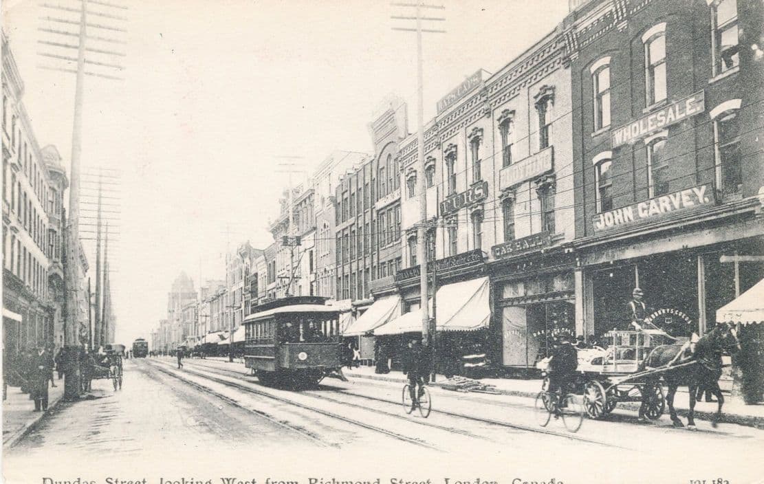 Cycles & Tram at Dundas Street Giant Fur Store London Canada Old Postcard