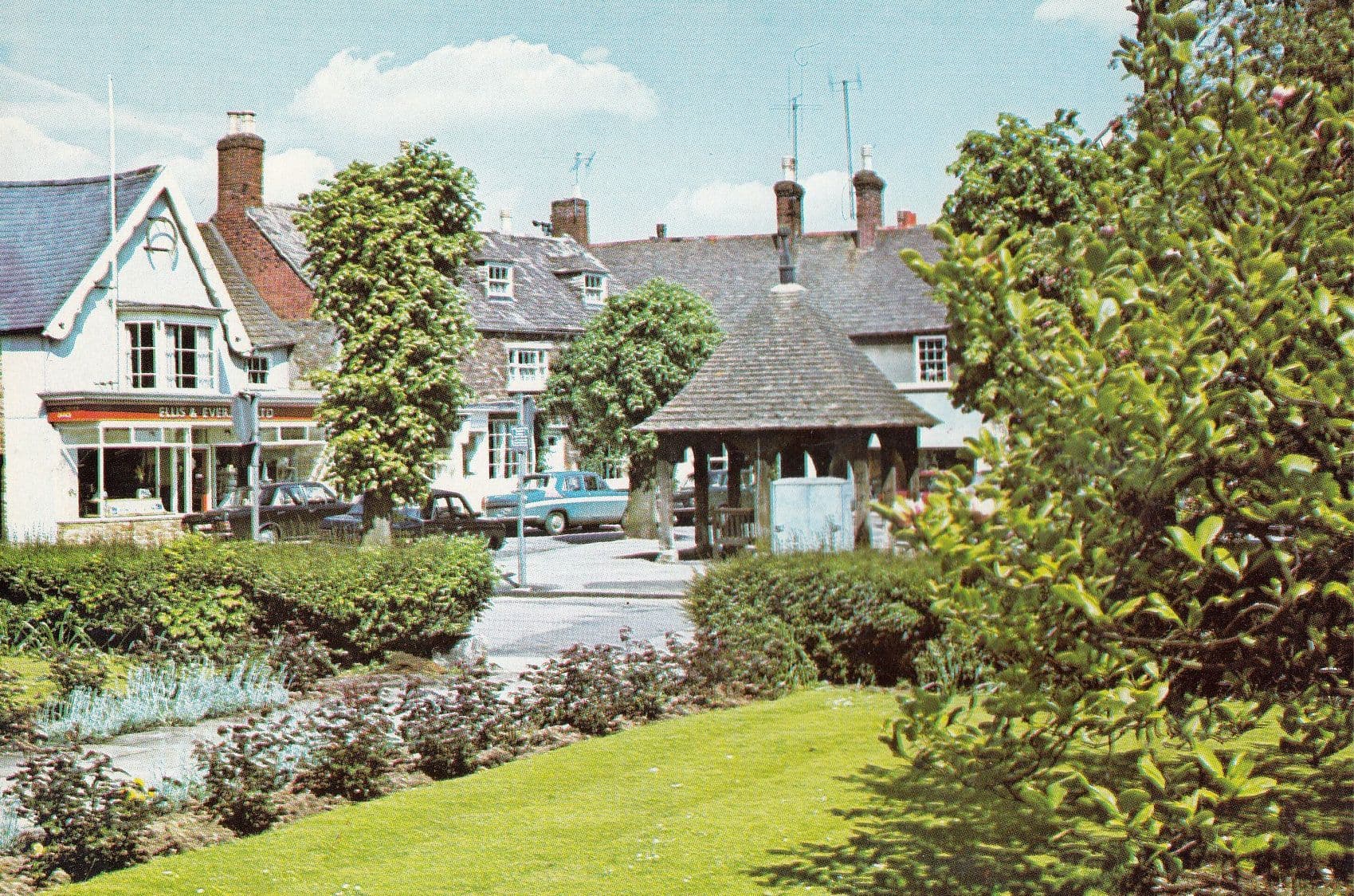 Market Place Oakham Charity Shop 1980s PostcardMarket Place Oakham Charity Shop 1980s Leicester Post