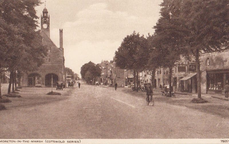 Moreton In The Marsh Elderly Man on Bicycle Vintage Postcard