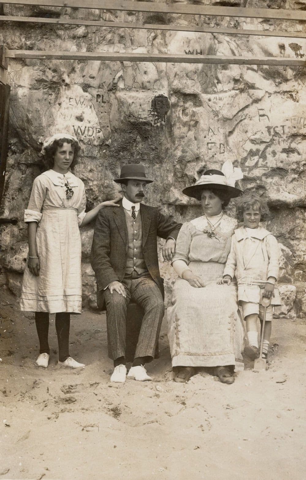 Posh Family On Beach With Interesting Wall Carvings Old Real Photo Postcard