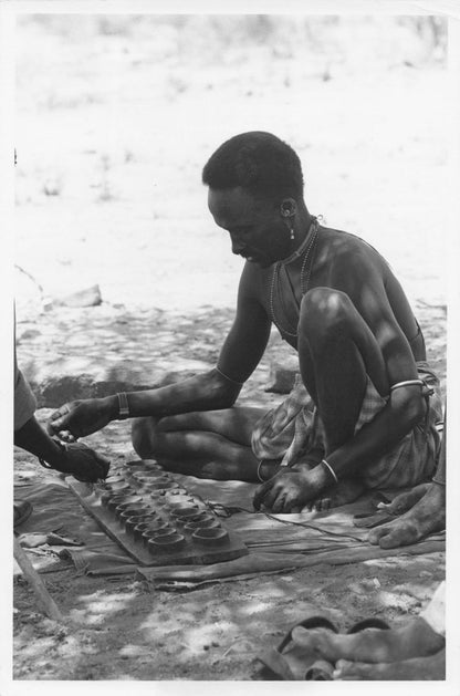 Rendille Man Playing Bao African Old Board Game Kenya Press Photo