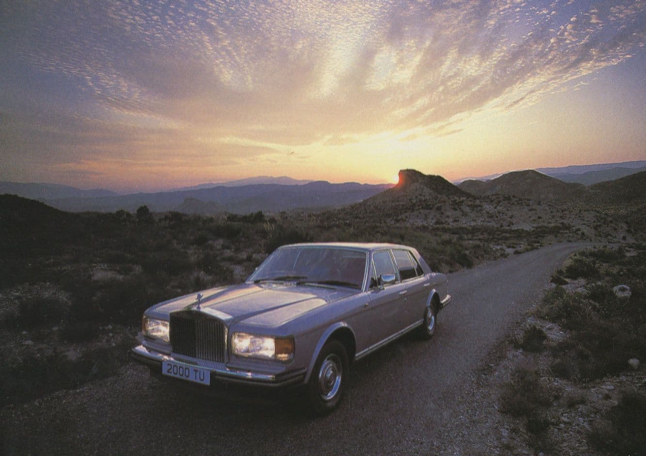Rolls Royce 1980s Silver Spirit Car In Glorious Sunset Postcard
