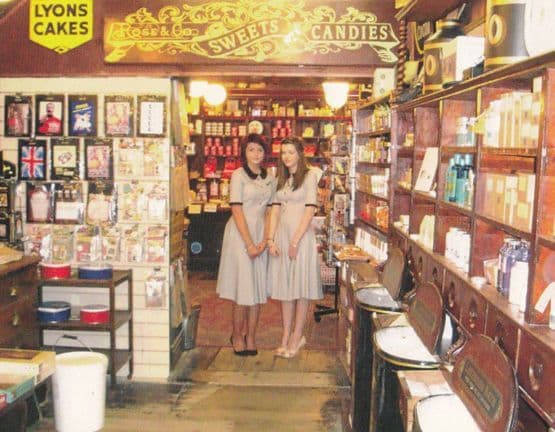 Staff at T Shirts Sweets Teas Candy at Haworth Confectioners Yorkshire Postcard