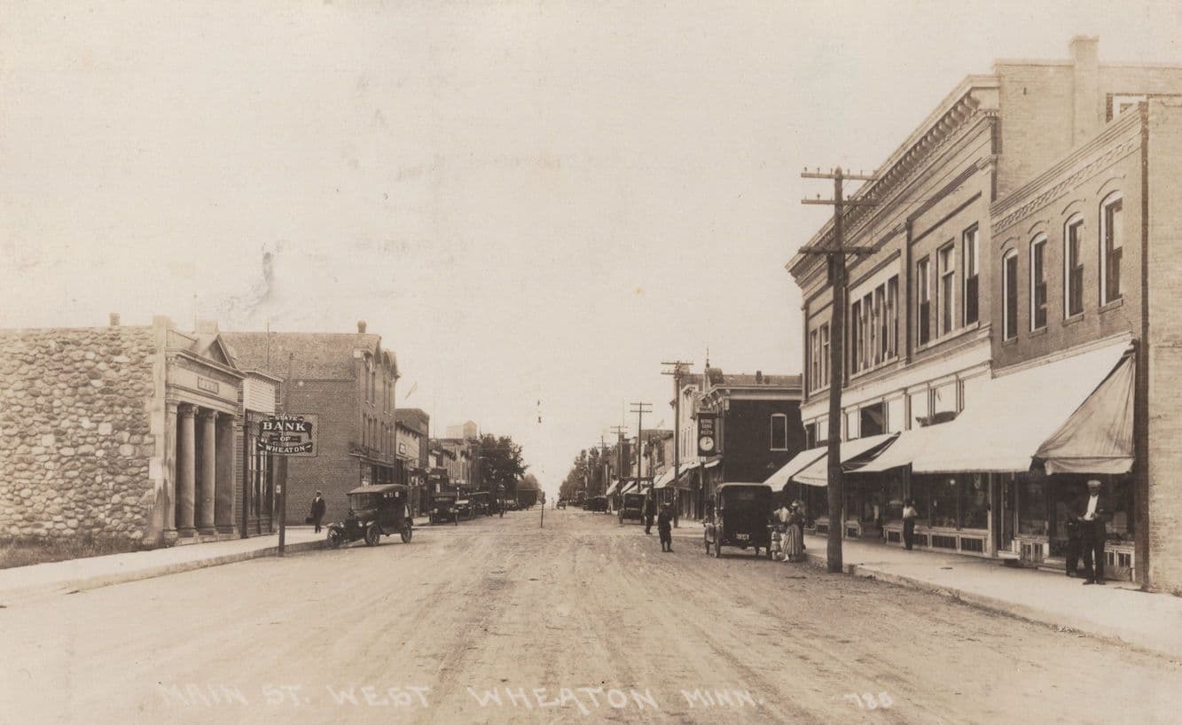 The Bank Of Wheaton West Main Street & Clock Sign USA Postcard